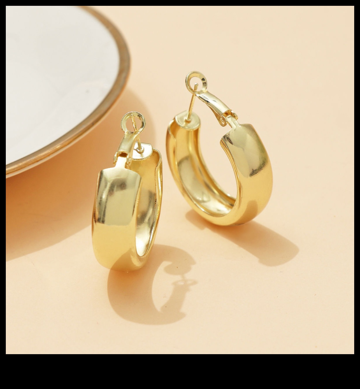 Eleganti apļi: rotējiet stilā ar mūsu elegantajiem apļveida auskaru dizainiem